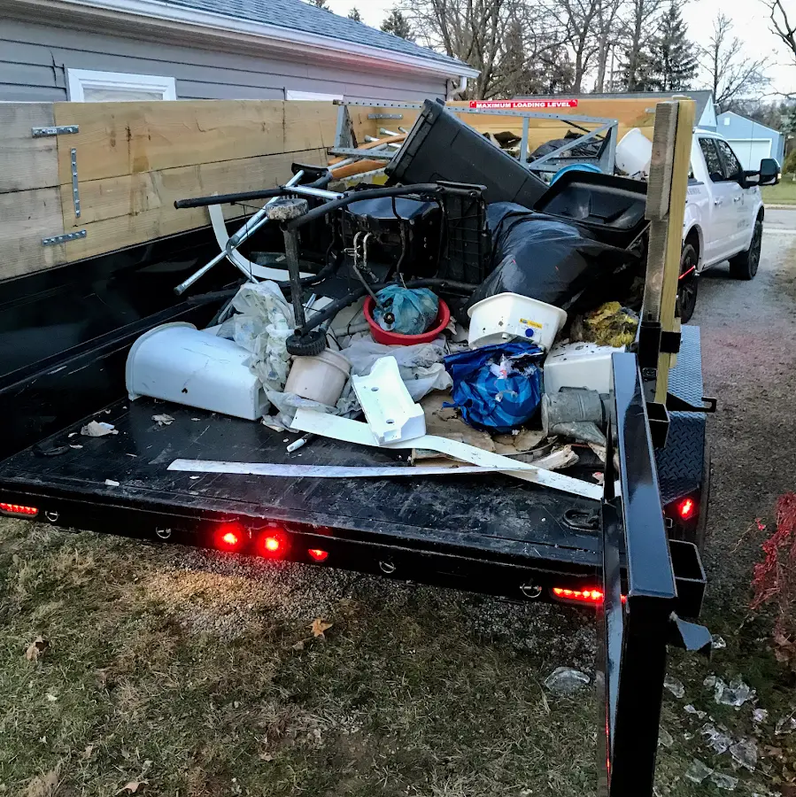 Roll-off dumpster delivered to a residential driveway in Durham